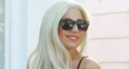 Lady Gaga wearing a tight black dress